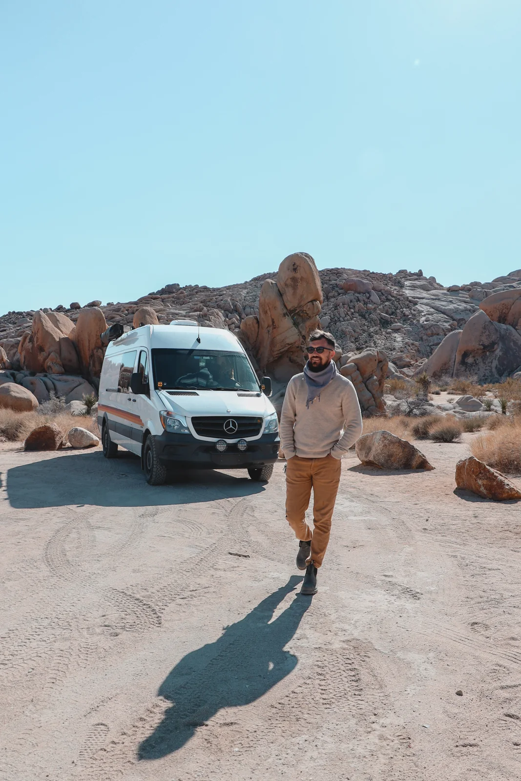 Co-founder Chase with a No Coast campervan.